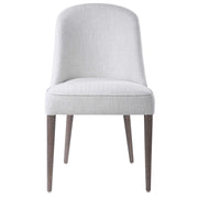 Set of two Uttermost Brie armless chairs with neutral fabric upholstery and wooden legs, modern design for living room decor.