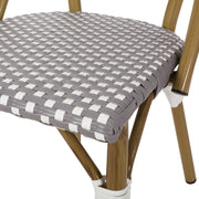 Noble House outdoor rattan and aluminum French bistro chair set with woven rattan seats and sleek metal frames.