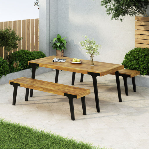 Noble House 3-piece outdoor dining set with light teak finish, includes a rectangular dining table and two matching benches.