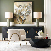 Uttermost Callais crackled aqua table lamp with textured ceramic base and white fabric shade on a wooden surface.