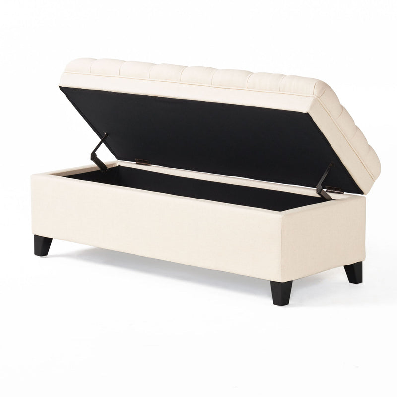 Noble House Juliana storage ottoman with birch wood legs, cushioned top, and spacious interior for versatile home storage.
