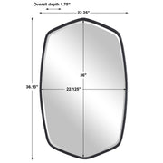 Uttermost Duronia iron wall mirror with a sleek, modern frame, hanging on a wall, showcasing its elegant reflective surface.