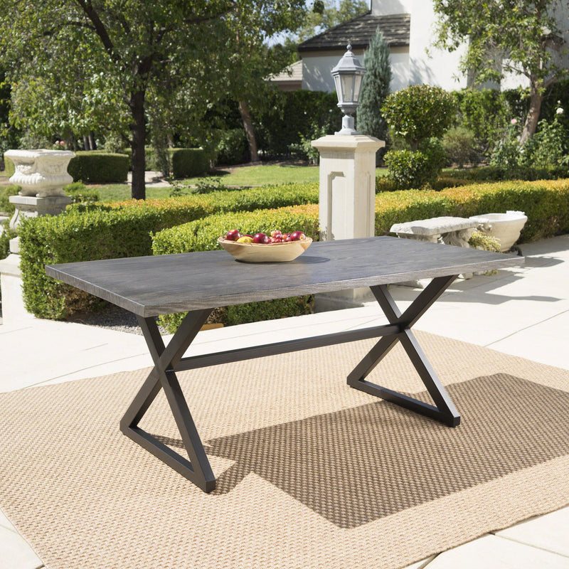 Outdoor aluminum dining table with steel frame by Noble House, featuring a sleek, modern design for outdoor patio dining.