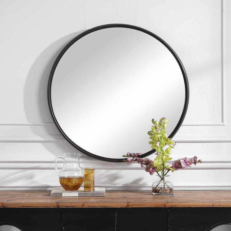 Uttermost Belham round iron wall mirror with a black finish, featuring a sleek and modern design for contemporary decor.