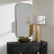 Wall mirror by Uttermost featuring a sleek, modern design with a rectangular glass surface and a minimalist frame.