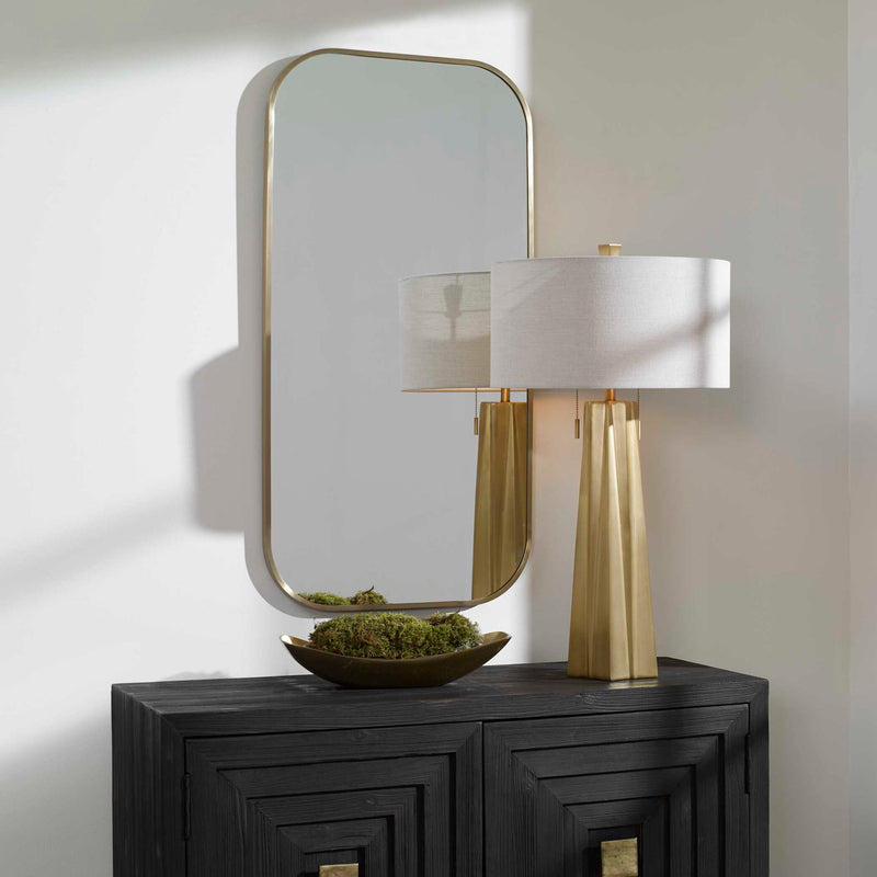 Wall mirror by Uttermost featuring a sleek, modern design with a rectangular glass surface and a minimalist frame.