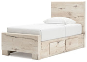 Signature Design by Ashley Lawroy panel storage bed with built-in drawers and sleek wood finish, showcasing its modern bedroom furniture design.