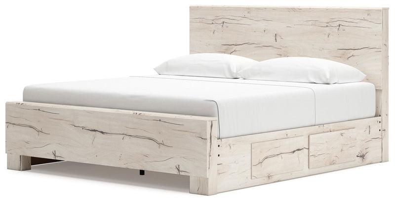 Signature Design by Ashley Lawroy panel bed with built-in storage drawers in a modern bedroom setting.