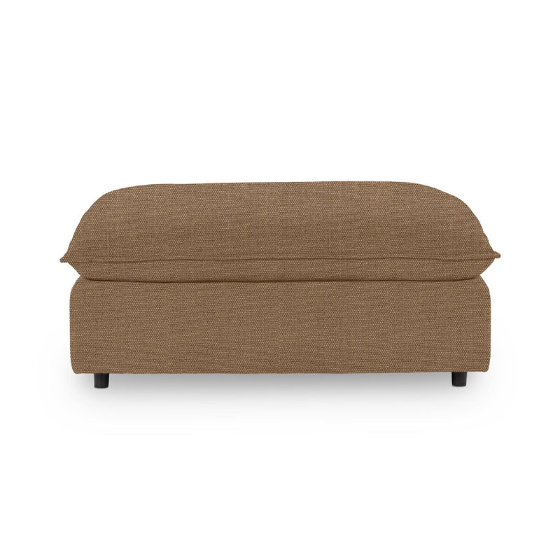 Classic Home Caplan upholstered ottoman with tufted fabric and wooden legs, versatile for living room or bedroom decor.