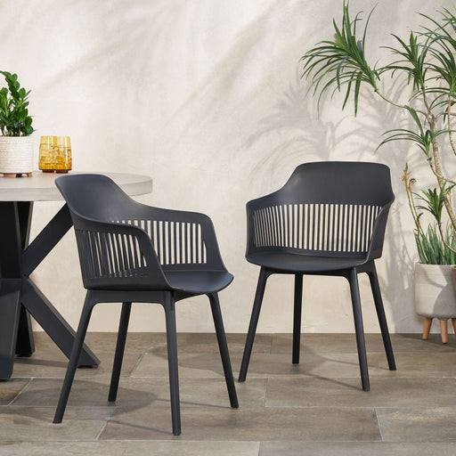 Pair of Noble House Dahlia chairs with wooden legs and cushioned seats, set of two, ideal for dining or living room decor.