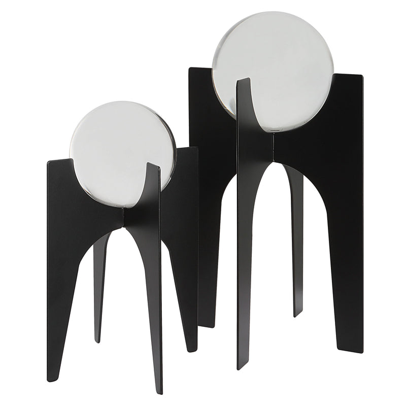 Uttermost Ellianna Crystal Spheres table accessory set with two decorative glass orbs on a sleek surface.