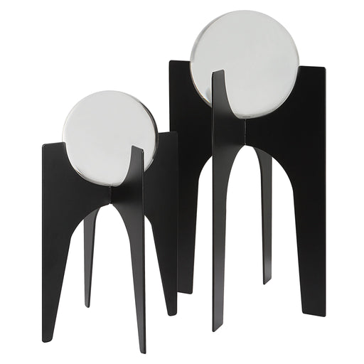 Uttermost Ellianna Crystal Spheres table accessory set with two decorative glass orbs on a sleek surface.