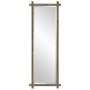 Uttermost Abanu ribbed dressing mirror for vanity, round shape with textured ribbed glass frame, modern bedroom decor.