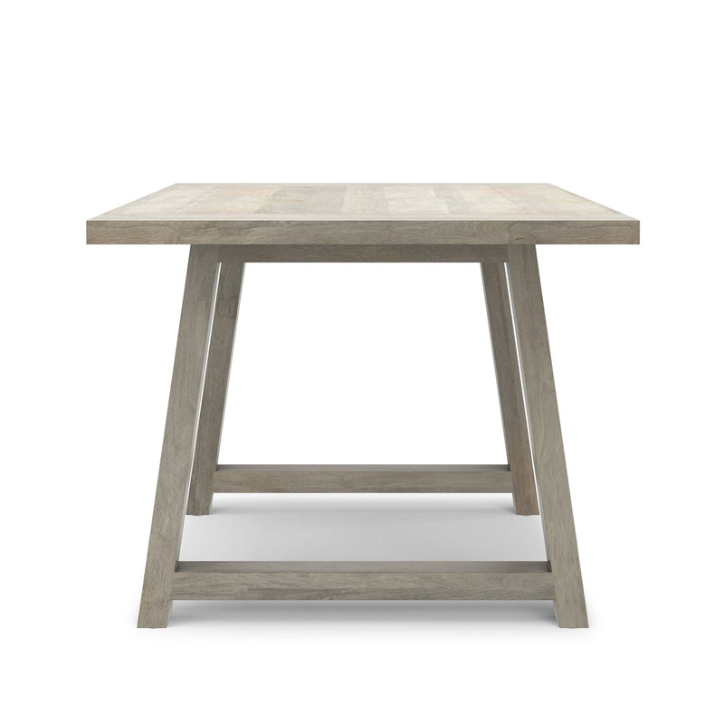 Wooden Whitley dining table by Simpli-Home with a rectangular surface and sturdy legs, ideal for family meals and gatherings.