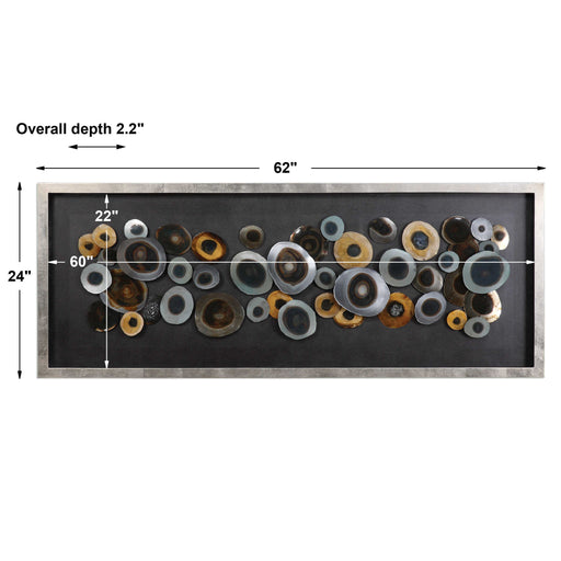 Silver shadow box wall decor discs by Uttermost, featuring layered metallic circles for modern home interior decoration.