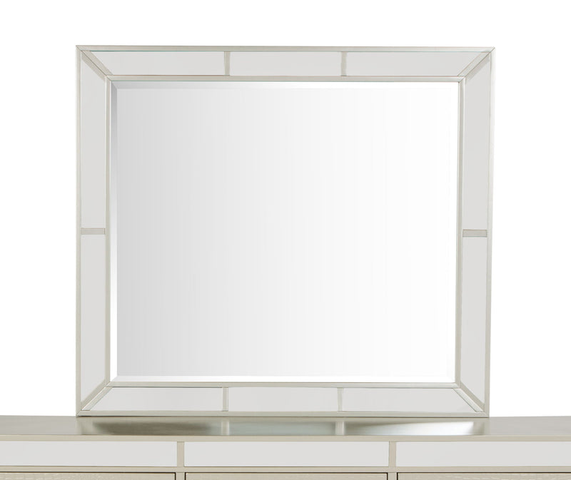Elegant contemporary mirror by Glory Furniture with a sleek, modern frame, reflecting a stylish interior space.