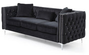 Glory Furniture Paige stationary sofa with plush cushions and modern design, shown in a cozy living room setting.