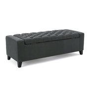 Dark gray contemporary storage ottoman with tufted top from Noble House, showcasing a soft fabric surface and functional storage space.