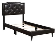Upholstered button tufted bed by Glory Furniture, cozy and stylish for relaxing bedroom spaces, with plush fabric and elegant design.