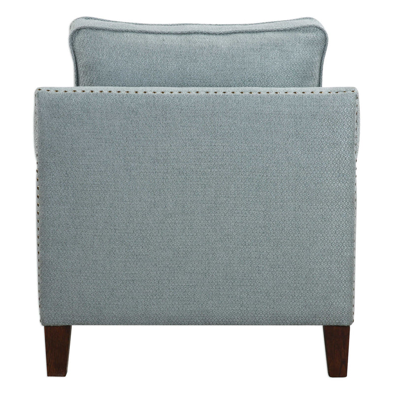 Uttermost Charlotta Sea Mist accent arm chair with plush fabric and elegant wooden legs, stylishly designed for living spaces.