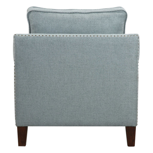 Uttermost Charlotta Sea Mist accent arm chair with plush fabric and elegant wooden legs, stylishly designed for living spaces.