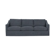 Classic Home Kipton upholstered stationary sofa with plush fabric and cushioned armrests in a cozy living room setting.