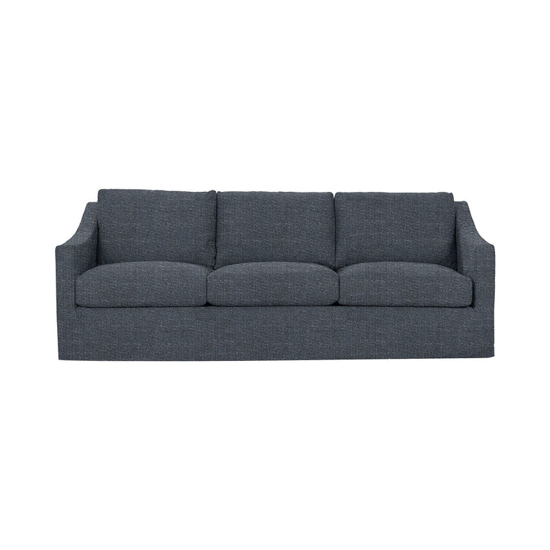 Classic Home Kipton upholstered stationary sofa with plush fabric and cushioned armrests in a cozy living room setting.