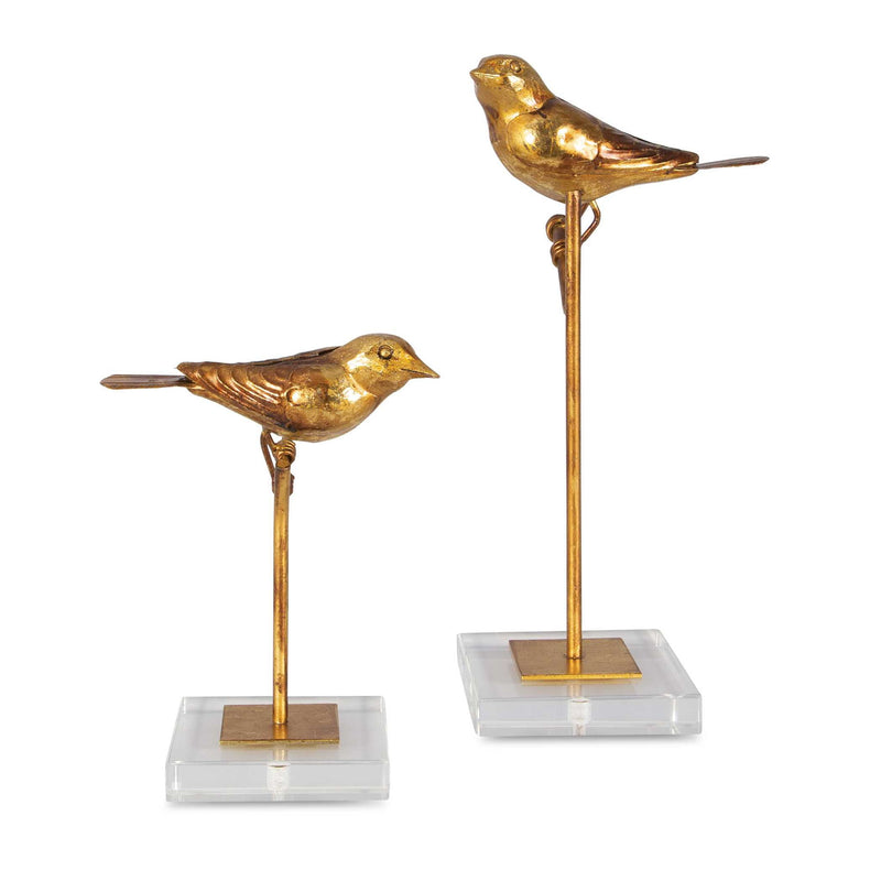 Light brown bird sculptures set of 2 by Uttermost, detailed passerine figurines for home decor.