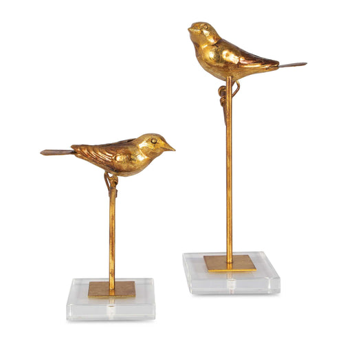 Light brown bird sculptures set of 2 by Uttermost, detailed passerine figurines for home decor.