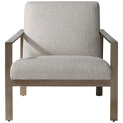 Uttermost beige contemporary accent arm chair with modern design, plush upholstery, and sleek wooden legs.