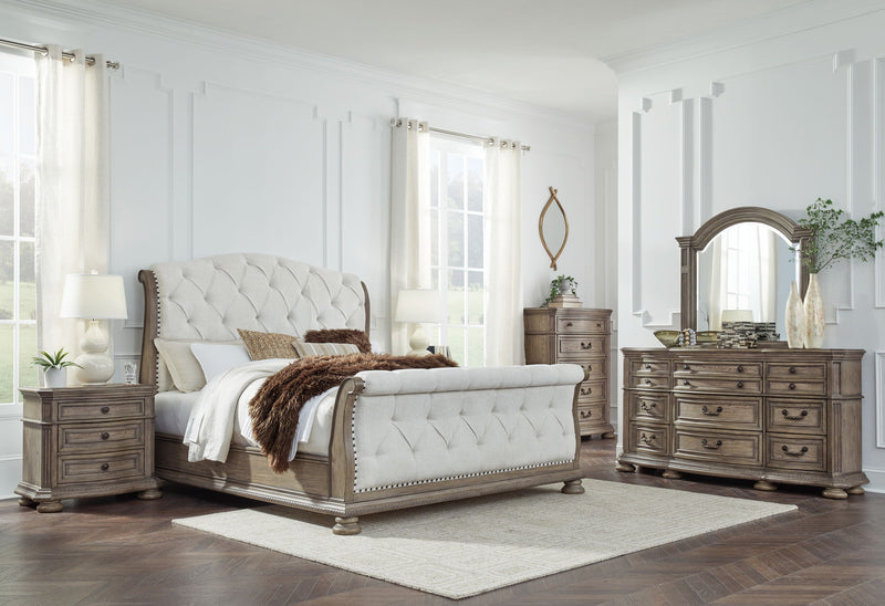 Signature Design by Ashley Ardenfield 6-piece bedroom set with bed frame, dresser, mirror, nightstands, and storage drawers.