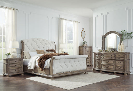 Signature Design by Ashley Ardenfield 6-piece bedroom set with bed frame, dresser, mirror, nightstands, and storage drawers.