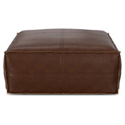 Large square Brody coffee table pouf by Simpli-Home, soft fabric accent pouf suitable for living room seating or decor.