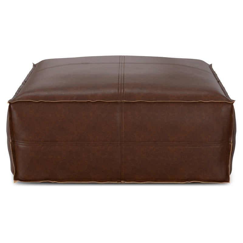Large square Brody coffee table pouf by Simpli-Home, soft fabric accent pouf suitable for living room seating or decor.