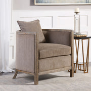 Gray chenille accent chair by Uttermost with plush upholstery and a modern design, perfect for living room or bedroom decor.