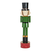 Noble House Nutcracker Christmas decor in green and red with festive holiday design on a wooden stand.