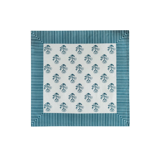 Set of four TOV Furniture Crissy cotton canvas napkins with blue vintage floral print, perfect for table setting or decor.
