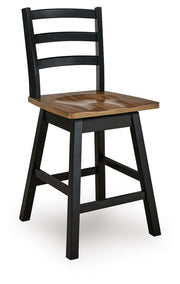 Set of two Wildenauer swivel stools by Signature Design Ashley, featuring wooden seats and metal legs for a modern dining look.