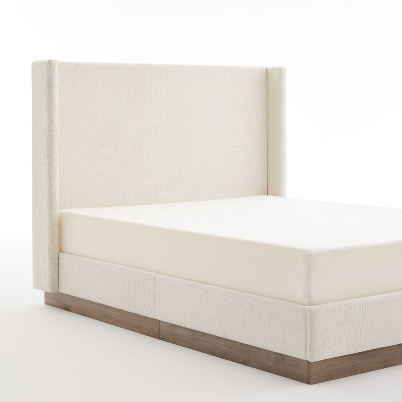 Minimalist upholstered wingback bed with wood base platform in neutral fabric, by House & Home Furniture.