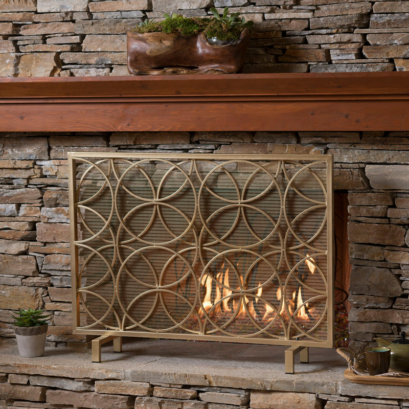 Noble House Thayer single panel iron fireplace screen with geometric design for protecting and decorating a fireplace opening.