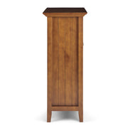 Handcrafted Acadian medium storage cabinet by Simpli-Home, featuring a natural wood finish and classic accent cabinet design.