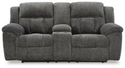 Reclining sofa from the Frohn living room set by Signature Design by Ashley®, showing plush fabric and padded armrests.