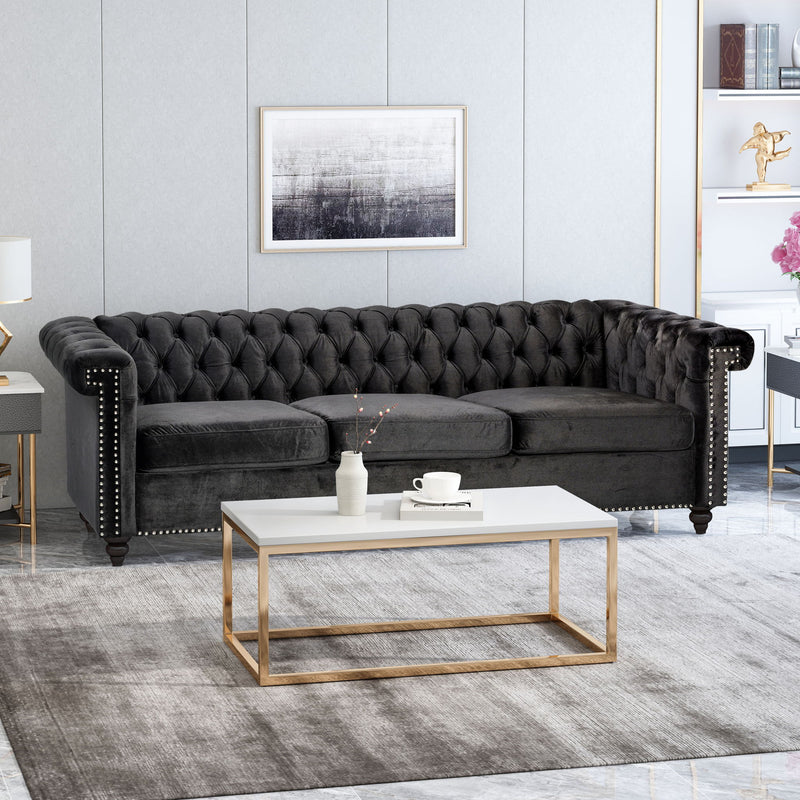 Noble House Chesterfield style 3-seater sofa with deep button tufting, featuring plush upholstery and classic stationary design.