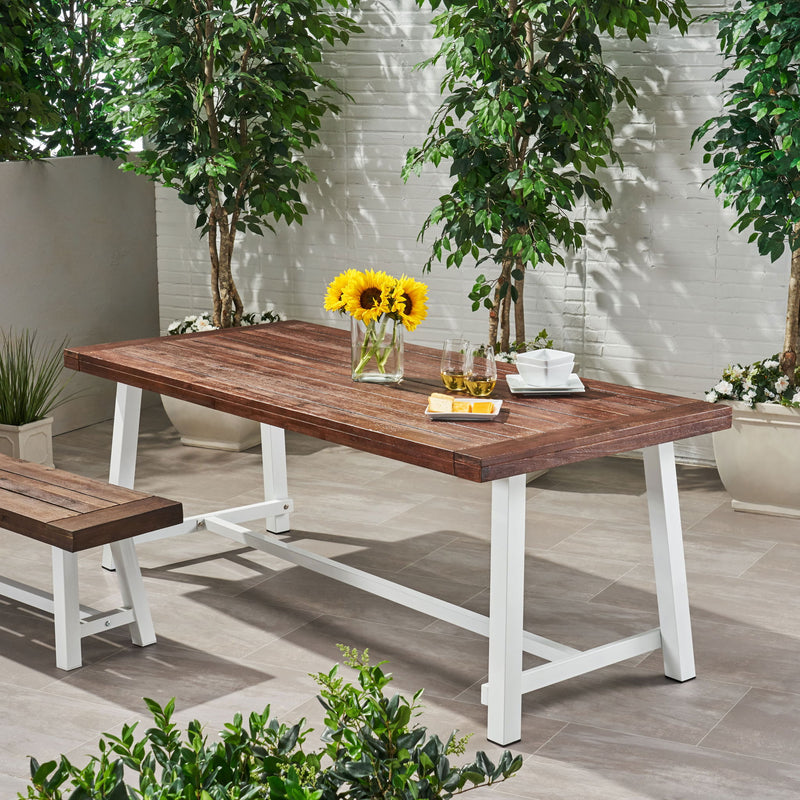 Noble House Equilibrium outdoor dining table with wooden frame and slat top for garden or patio seating.