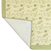 TOV Furniture Dolce table cloth placemat set with elegant fabric and intricate patterns on a dining table.