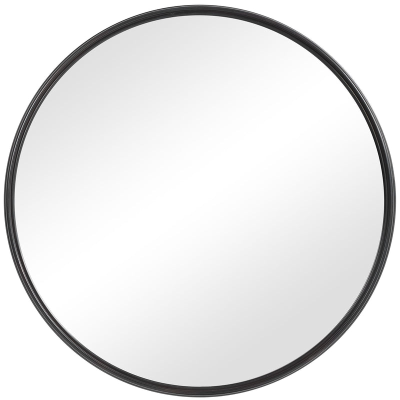 Round black iron wall mirror by Uttermost with a sleek, minimalist design, showcasing a smooth circular frame.