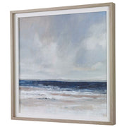Uttermost Distant Land framed print featuring blue landscape artwork, displayed in a sleek frame.