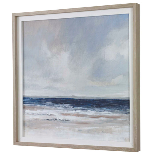 Uttermost Distant Land framed print featuring blue landscape artwork, displayed in a sleek frame.