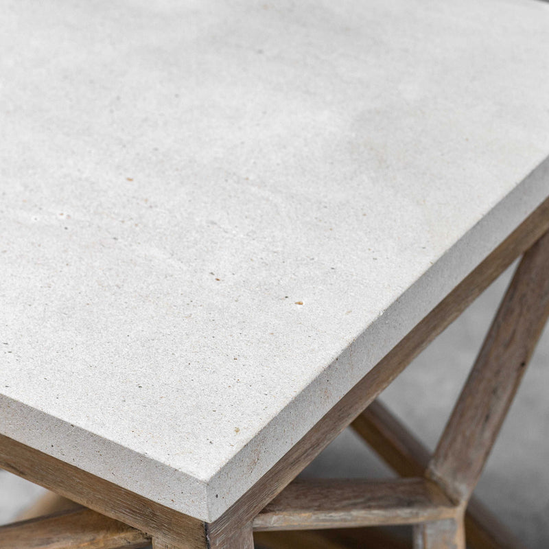 White and light brown stone end table from Uttermost's Catali collection, featuring a modern design and smooth surface.