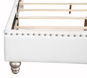 Elegant upholstered bed by Glory Furniture featuring a stylish transitional design with plush fabric and a sturdy wooden frame.